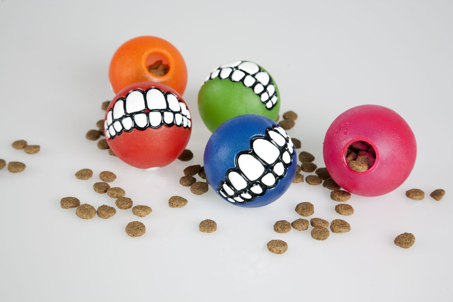 Rogz Fun Dog Treat Ball in various sizes and colors, Medium, Red