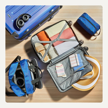 Amazon Basics 4-Piece Luggage Set, Including Two Hardside Suitcases With Multi-directional Spinner Wheels (22" Carry-On and 28" Checked), 15" Tote Bag and 10" Compact Travel Bag, Navy Blue